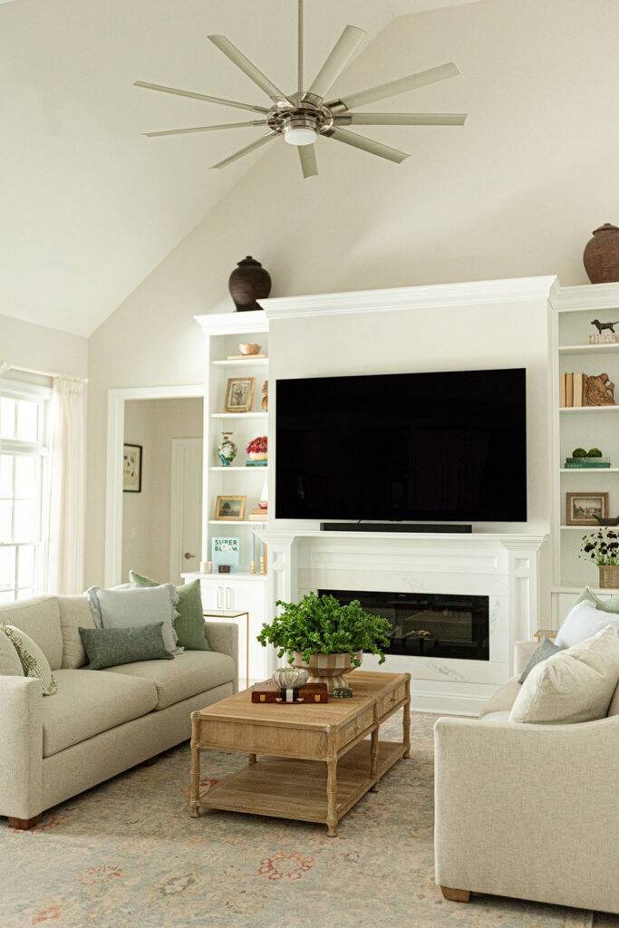 Blue and cream area rug with warm accents in Cape Charles living room